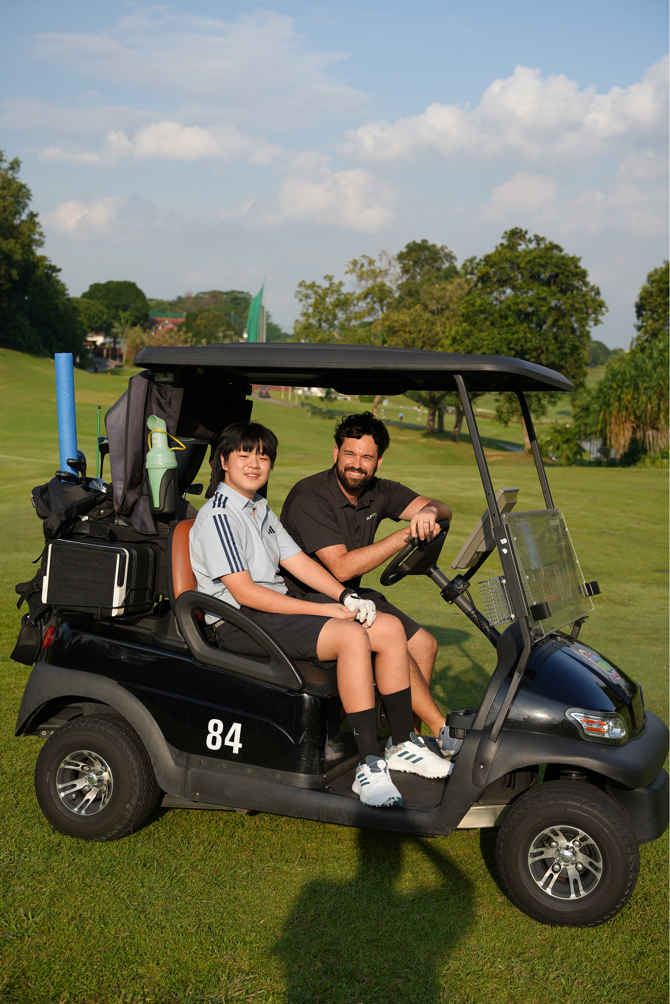 Jamie Whenman with student on the course